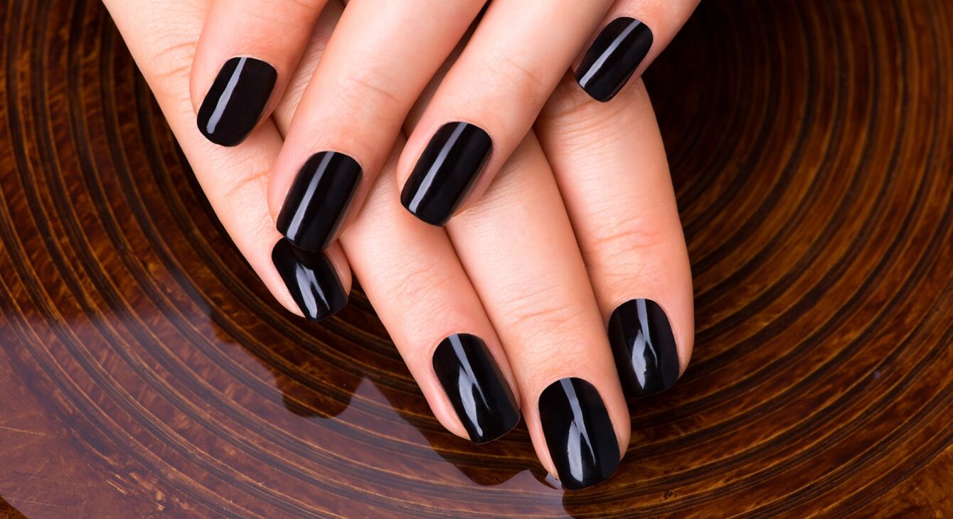 beautiful-women-hands-with-black-manicure-after-spa-procedures-spa-treatment-concept