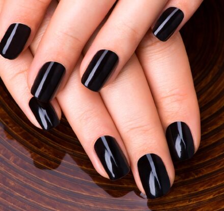 beautiful-women-hands-with-black-manicure-after-spa-procedures-spa-treatment-concept